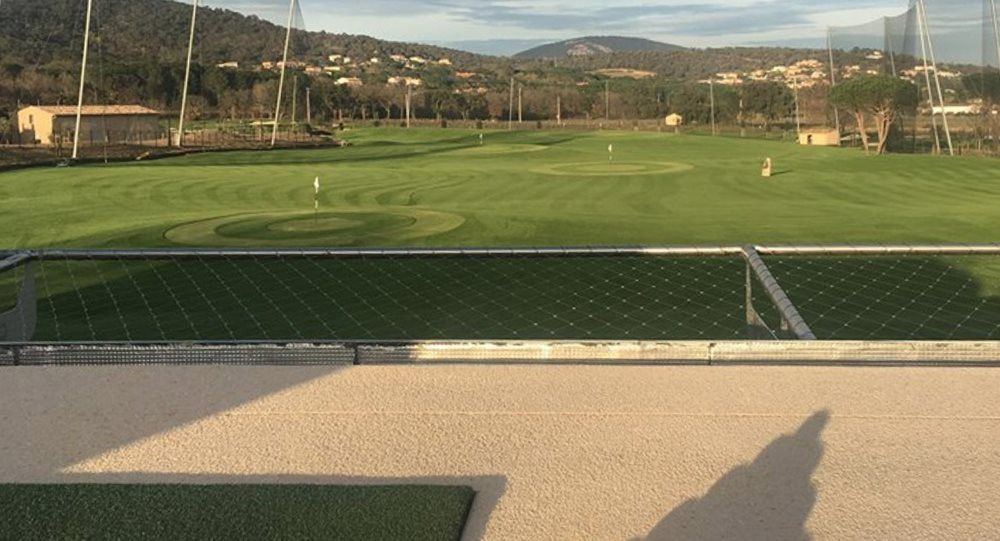Albuquerque Synthetic turf beside natural grass golf course