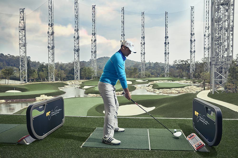 Albuquerque Golfer on synthetic grass tee box